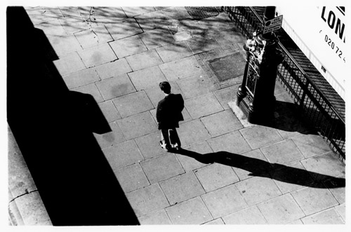 Man walking along the Thames
